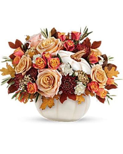 <div class="m-pdp-tabs-description">
<div id="mark-3" class="m-pdp-tabs-marketing-description">Elegant crème roses blend with the heartwarming hues of autumn in this charming bouquet, artfully arranged in a white lidded pumpkin bowl, a versatile fall decor favorite!</div>
</div>
<p id="arrngDescp">This charming arrangement features crème roses, white miniature carnations, burgundy cushion spray chrysanthemums, yellow cottage yarrow, olive, and brown copper beech.</p>