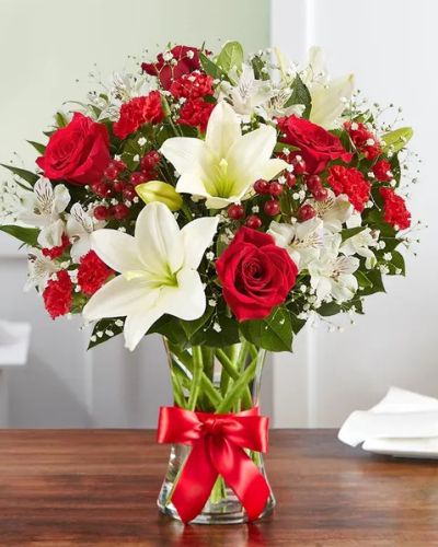 <p>That feeling of bliss, captured in a bouquet. Inspired by the beauty of the European countryside, our best seller brings together radiant roses and lush lilies in a glass vase wrapped in red ribbon. Whatever your reason for reaching out, it’s a gift that delivers on delight.</p>