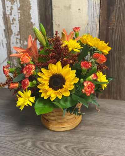 <p>Experience the splendor of autumn with this gorgeous floral arrangements. Crisp fall hues presented in a one of a kind container that will make any recipient smile!</p>
<hr />
<hr />
<p> </p>