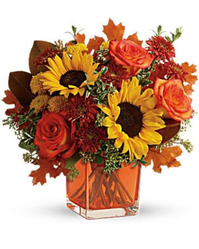 <div id="mark-3" class="m-pdp-tabs-marketing-description">Greet the new season with this heartwarming sunflower and rose bouquet, presented in a cheerful orange cube vase.</div>
<div id="desc-3">
<ul>
<li>This bright bouquet includes orange roses, yellow sunflowers, gold cushion spray chrysanthemums, rust cushion spray chrysanthemums, seeded eucalyptus, oregonia, and magnolia leaves.</li>
</ul>
</div>
